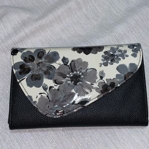 Black and white clutch with built-in wallet